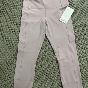 LULULEMON, fast and Free leggings.